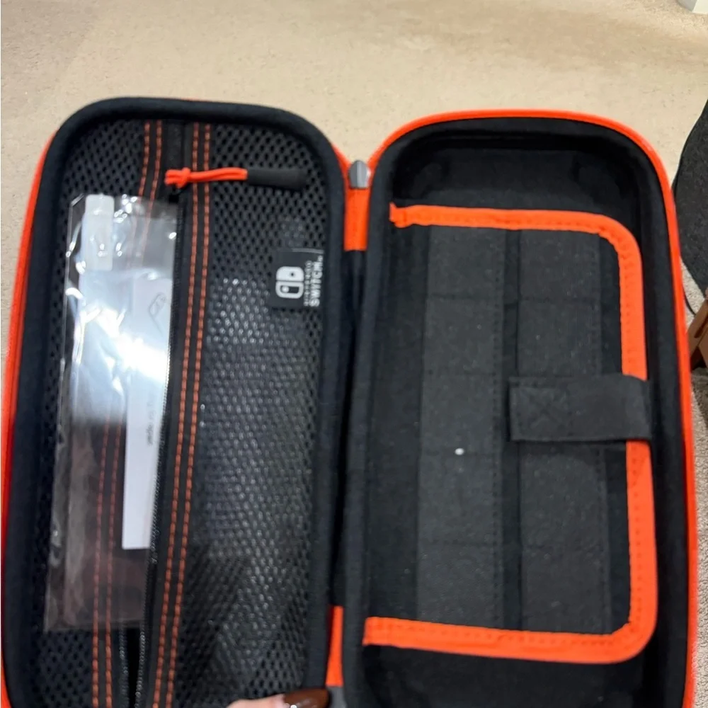 Nintendo Black and Orange Switch Case